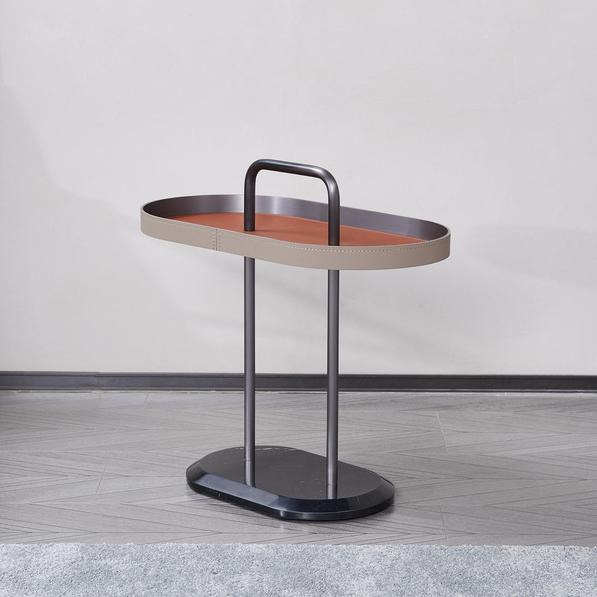Geometric round bistro side table by BEACON featuring a modern design with a metal frame and a circular tabletop.