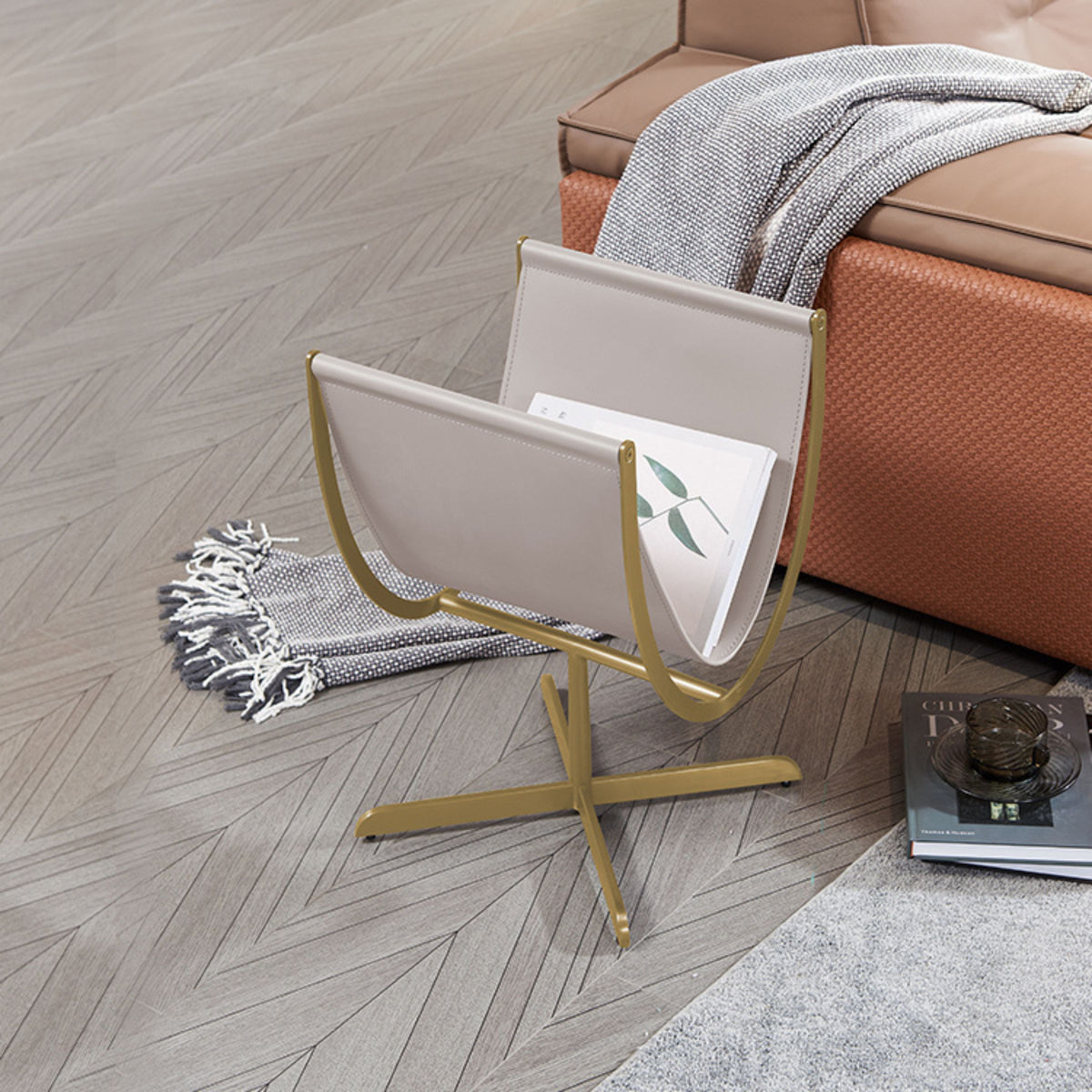 Beige side table with gold brushed saddle leather top and stainless steel legs, modern design by BEACON for living room decor.