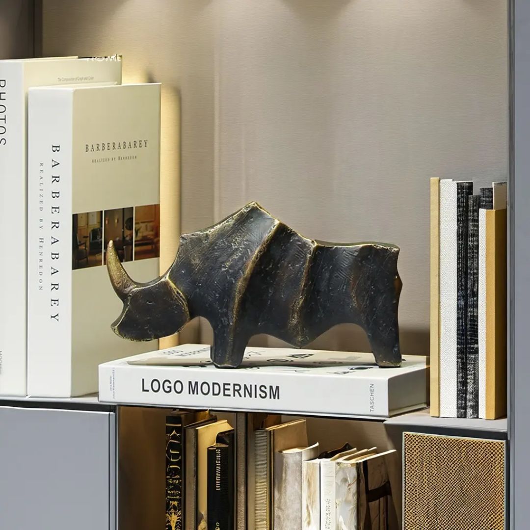 Golden Horned Rhino B home decor figurine by BEACON, featuring a detailed golden rhino sculpture for stylish interior decor.