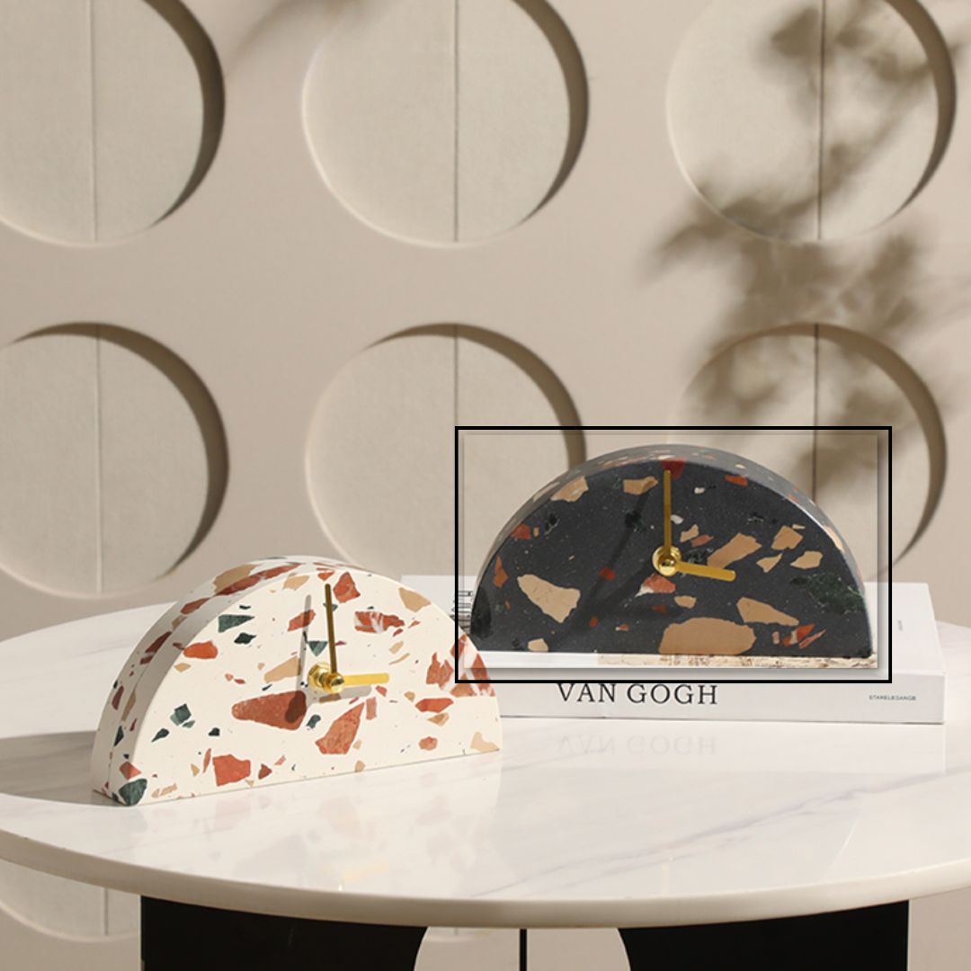 Dark-colored half-round stone table clock by BEACON, featuring a stylish design and easy-to-read clock face.