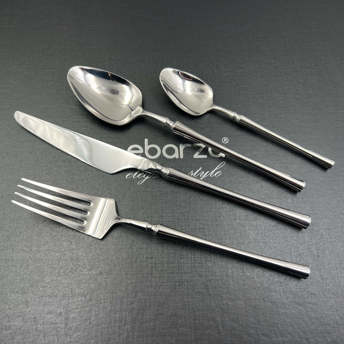 Jance 24-piece mirror silver cutlery set by BEACON, includes forks, knives, spoons, and teaspoons for elegant dining.