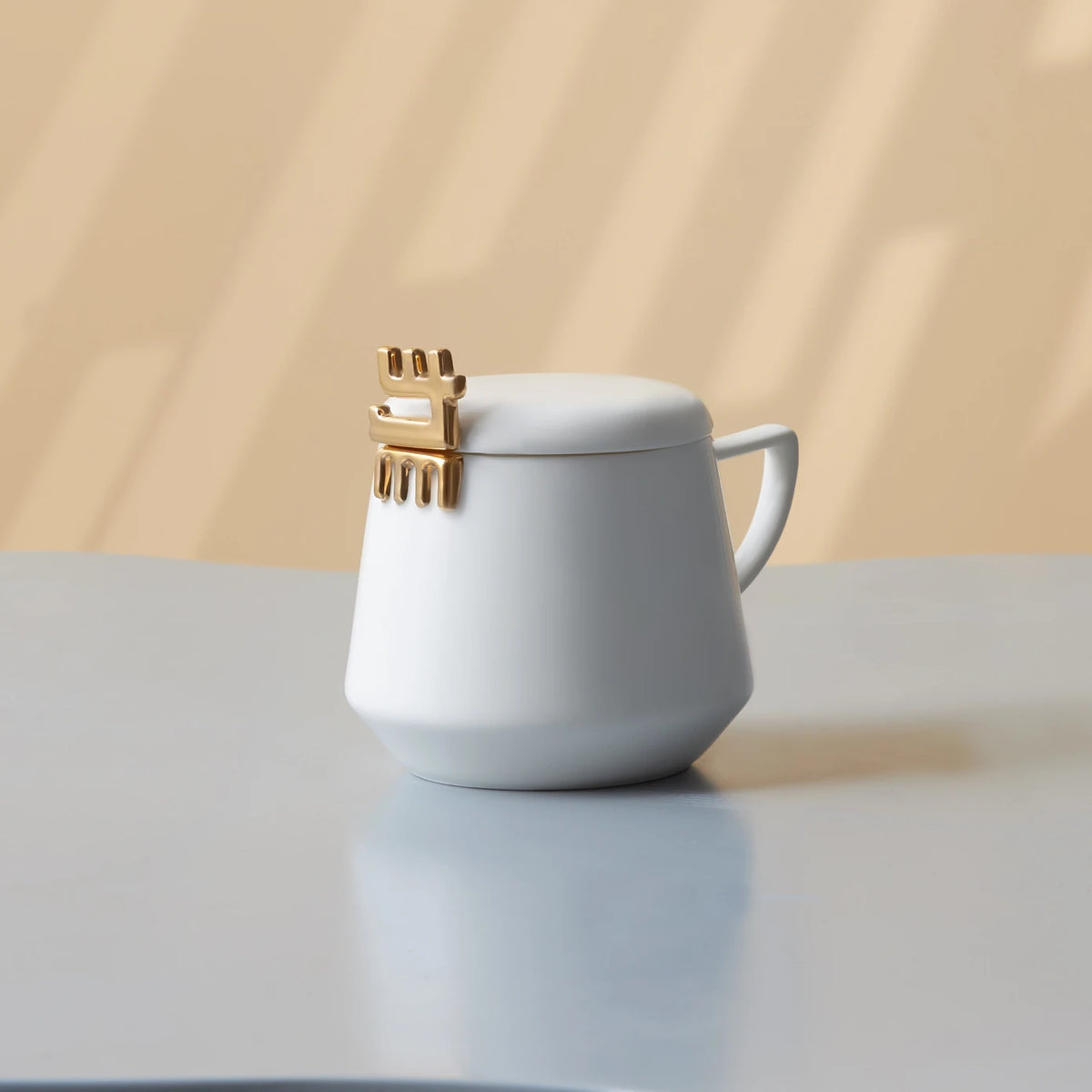 Karaca 50th Year Signature Collection white ceramic mug with lid, 350 ml, featuring elegant design and branding.