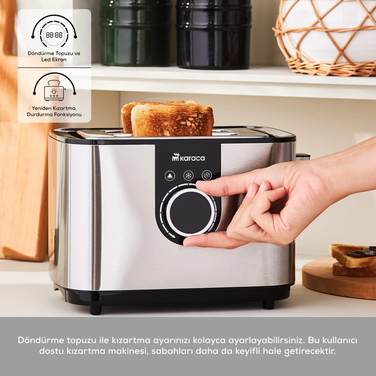 Karaca Inox Toaster 2303 kitchen appliance with stainless steel exterior, four bread slots, and control buttons on top.