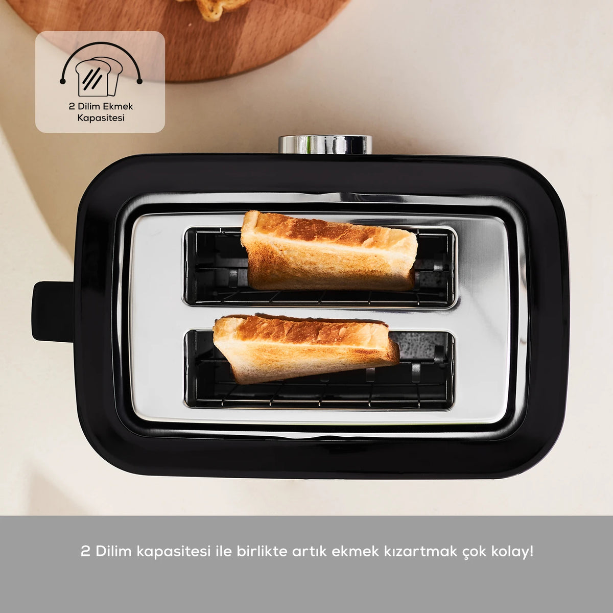 Karaca Inox Toaster 2303 with stainless steel finish, four bread slots, and control dials for toasting bread and bagels.