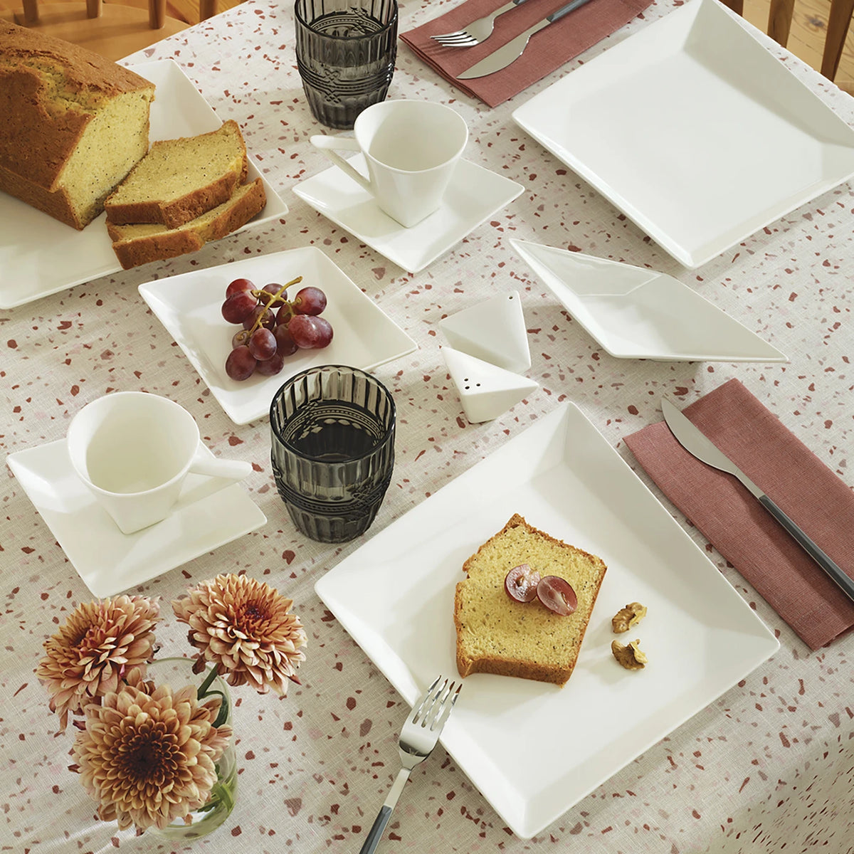 Karaca Origami New Bone 26-piece dinnerware set with plates, bowls, and cups for 6 people, featuring elegant ceramic design.