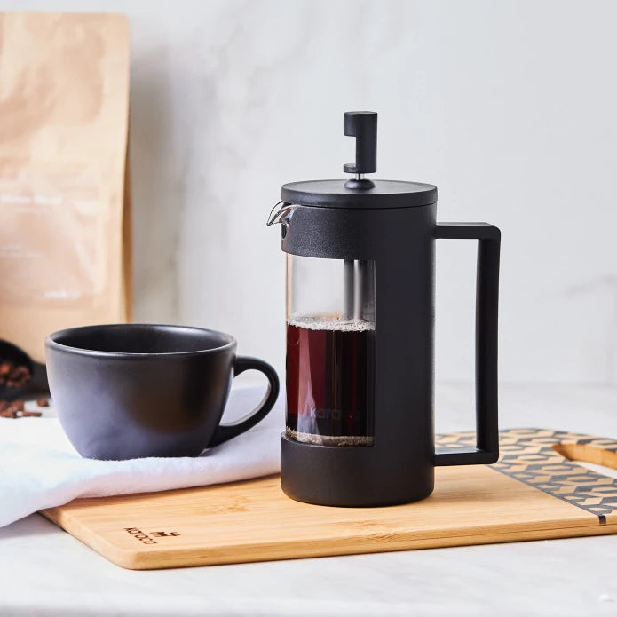 Karaca Pamir French Press 600 ml in glass with black plastic handle, kitchen appliance for brewing coffee or tea.