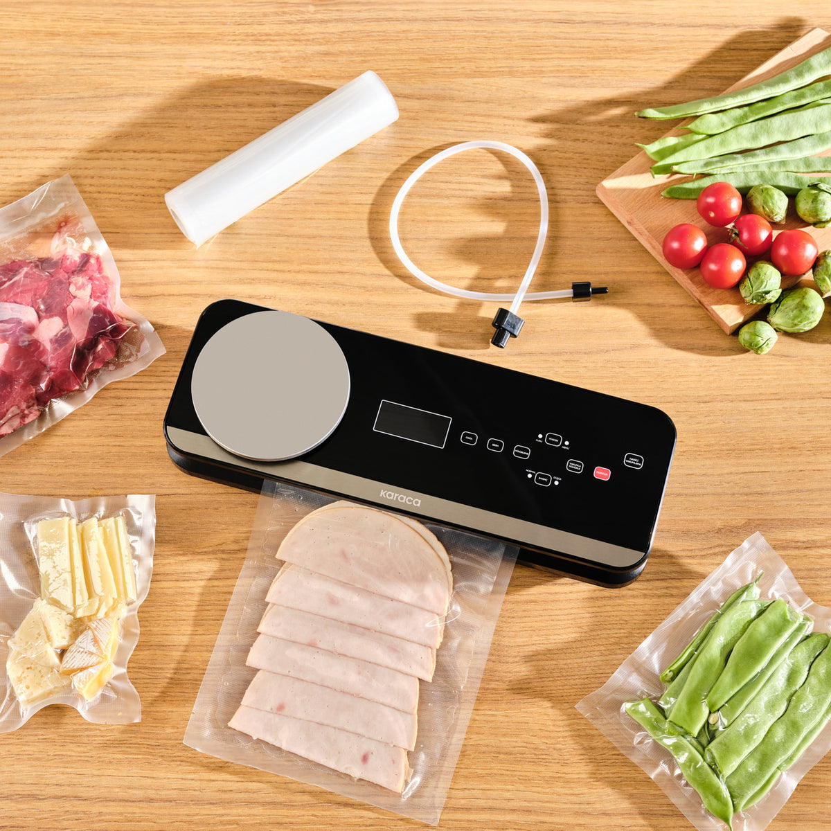Karaca Seal and Fresh Inox weighed vacuum machine for kitchen appliances, showcasing stainless steel design and control panel.