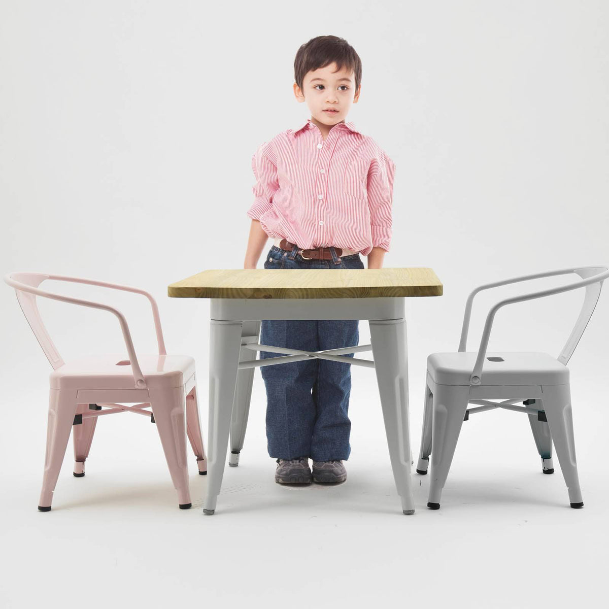 Metal kids chair from RUDI K01-W display item, featuring a sturdy frame and colorful seating for children.