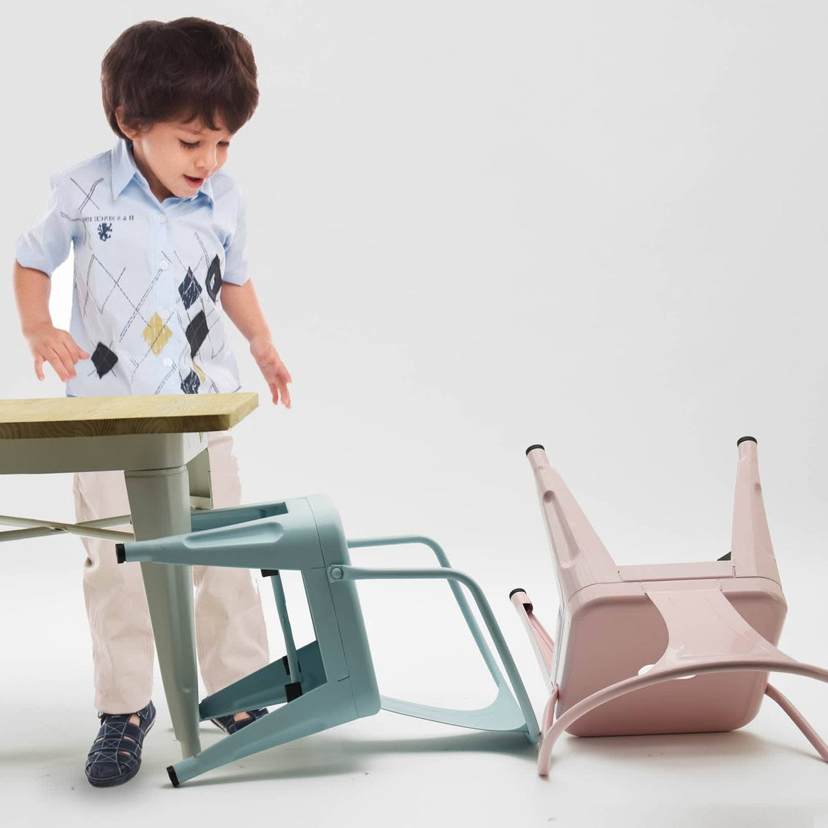 Metal kids' chair from RUDI, model K01-W, featuring a sturdy frame and kid-friendly design, perfect for children's play areas.