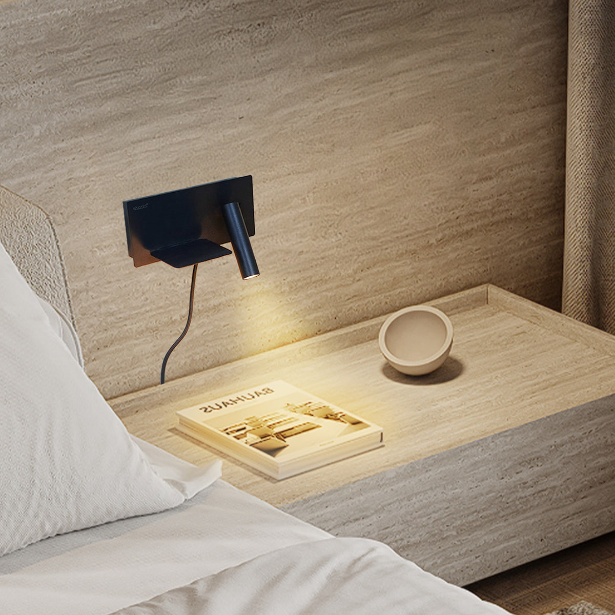 BEACON Kross hotel-style wall reading lamp with sleek black finish, mounted on a headboard for bedside lighting.