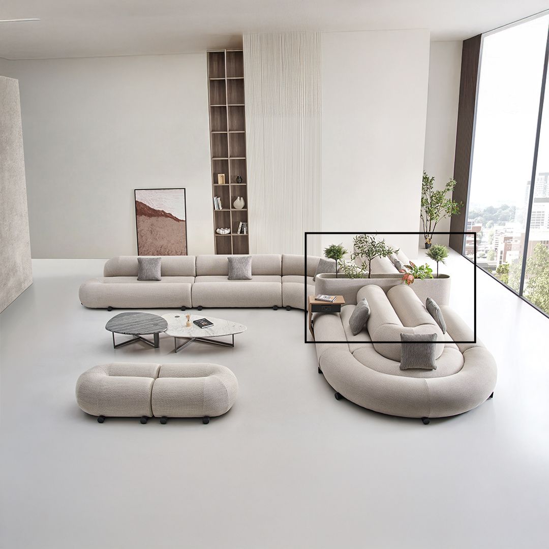 Laisi Flower Base Planter Box by BEACON, a stylish flower planter with a modern design, shown on a sofa.