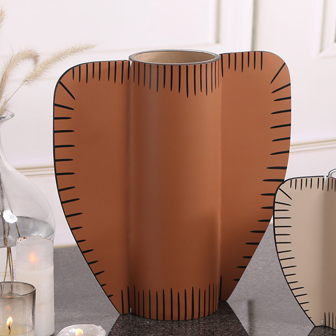 Leather vase by BEACON, dry and fresh finish, with a sleek, modern design perfect for decorative floral arrangements.