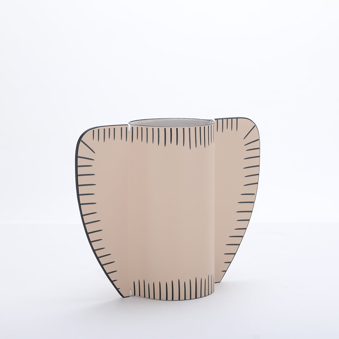 Beige leather vase from BEACON, designed for dry or fresh flowers, with a sleek, modern cylindrical shape.
