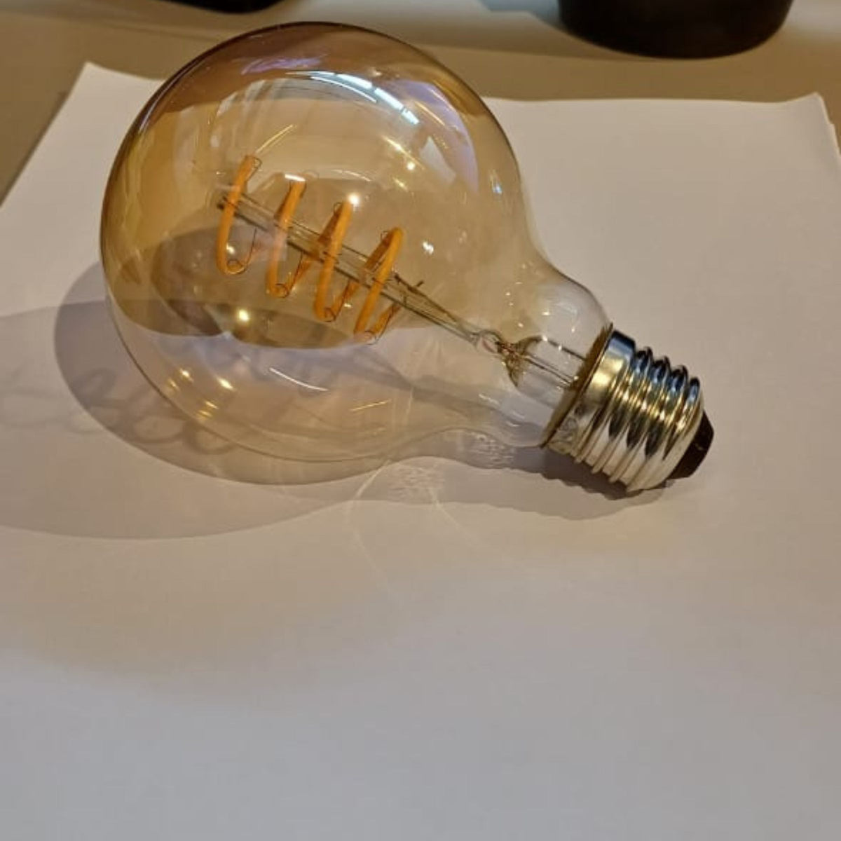 BEACON GYDG LED E27 Vintage Bulb G80 Spiral Soft LED Filament bulb showcasing warm glowing spiral filament design