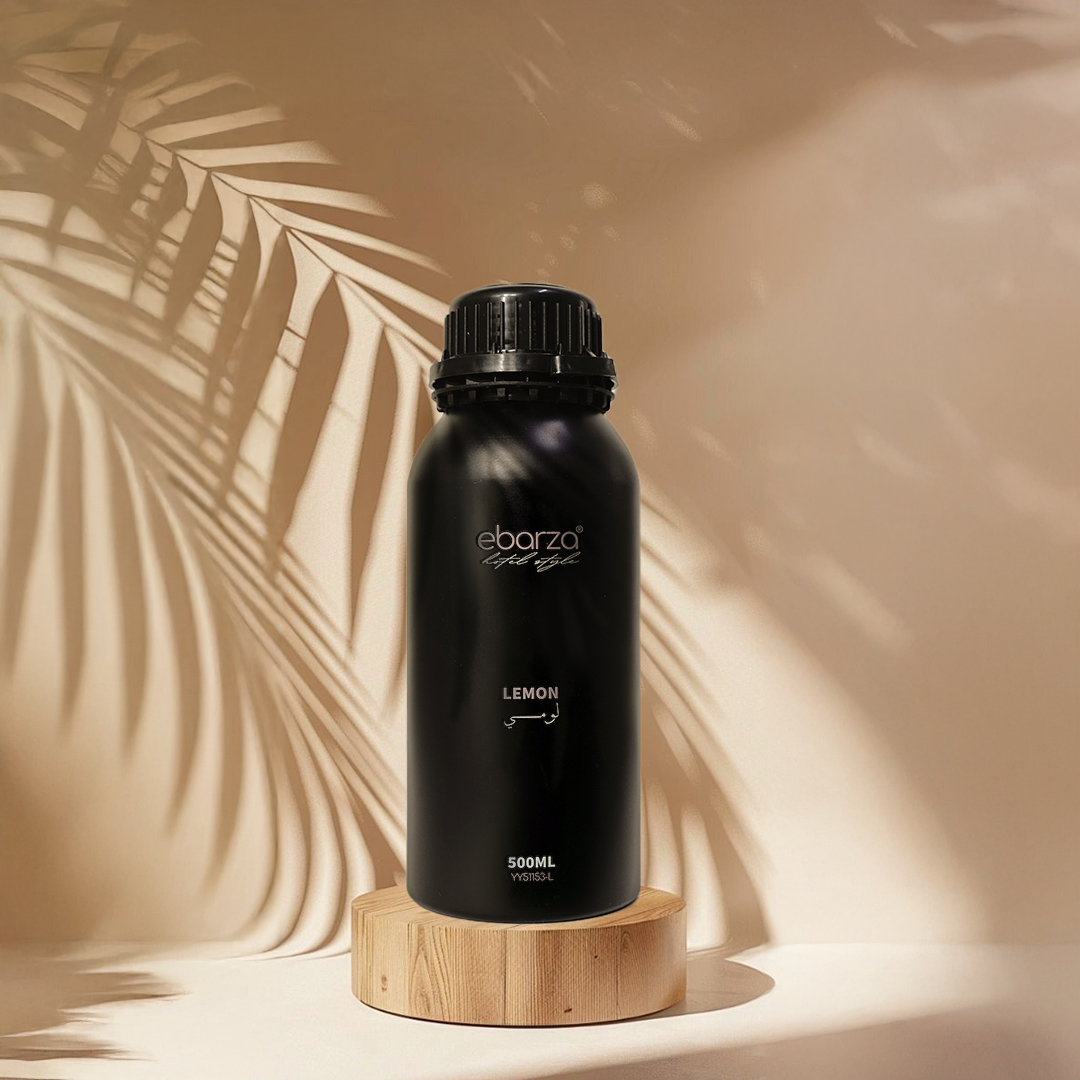 Lemon essential oil bottle from BEACON, 500ml, with a clear label and yellow lemon illustration on the packaging.