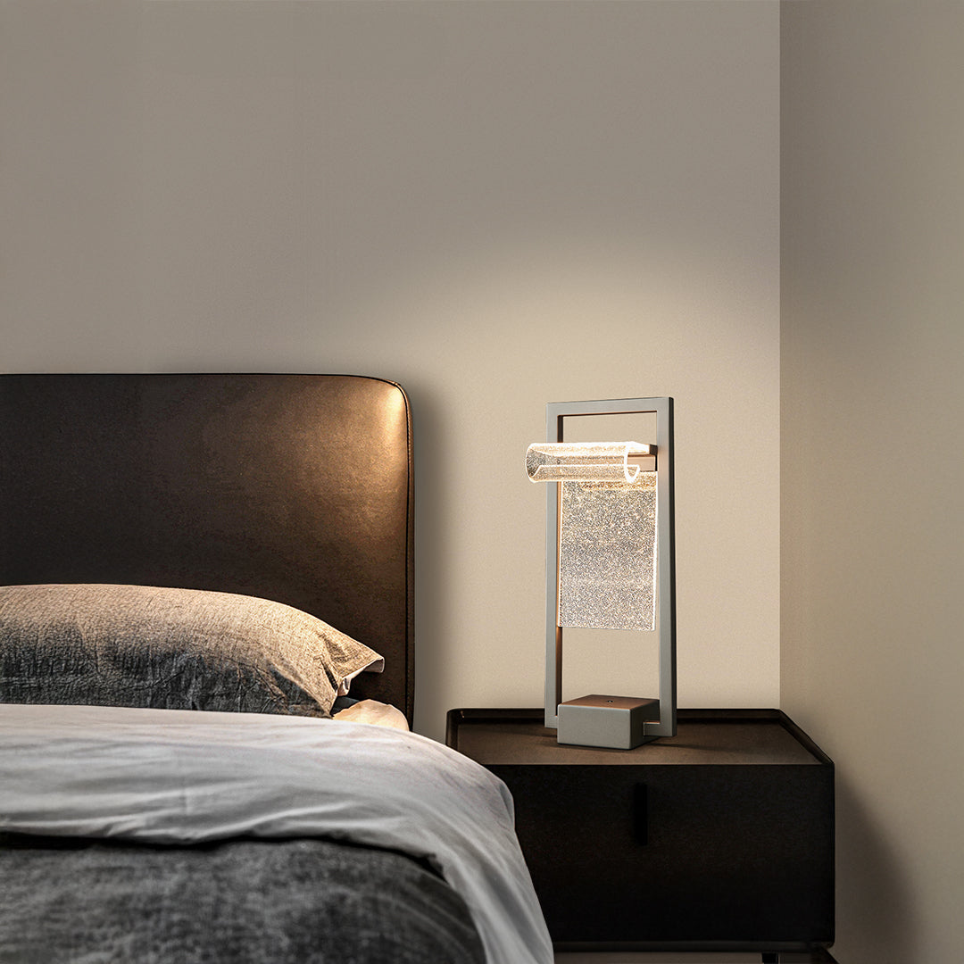 Luxonis desk table lamp by BEACON, modern design with a sleek base and adjustable arm for focused lighting.