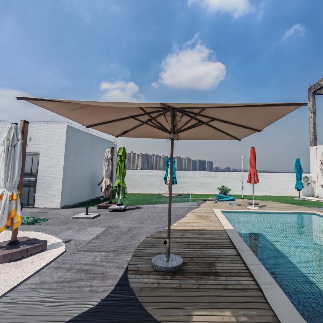 Luxury hydraulic center pole outdoor umbrella by BEACON with LED lighting, model MS-1602-2A, featuring durable fabric and sturdy design.