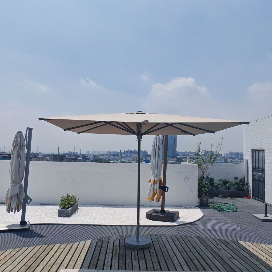 Luxury hydraulic center pole outdoor umbrella by BEACON with LED lighting, model MS-1602-2A, featuring a sturdy design and stylish shade.