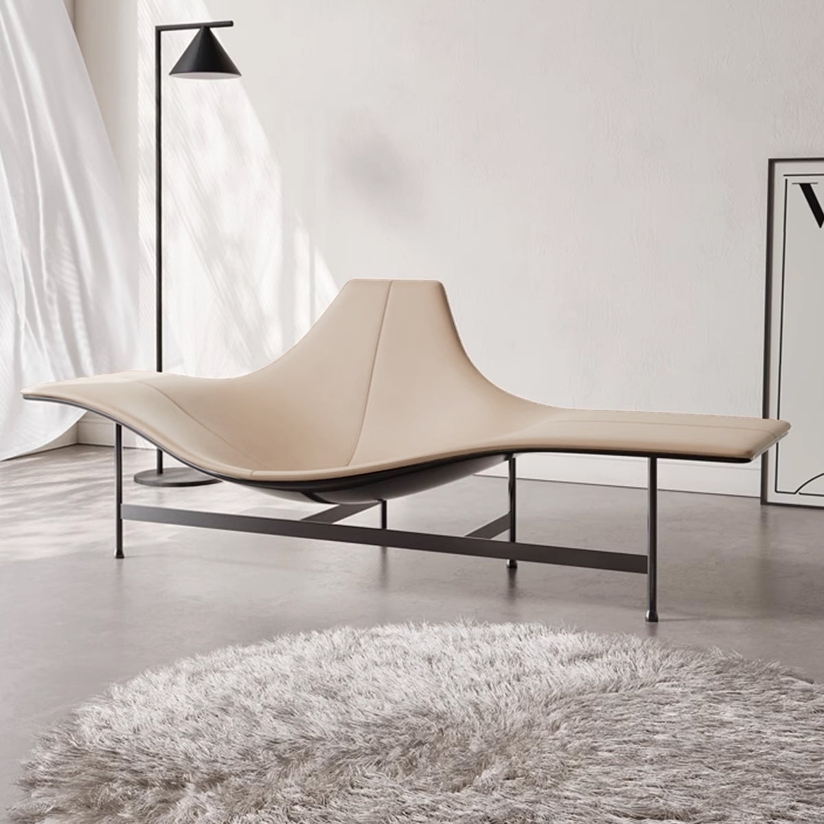 Beige Maserati fiberglass lounge armchair with sleek design, modern curves, and comfortable seating in a contemporary setting.