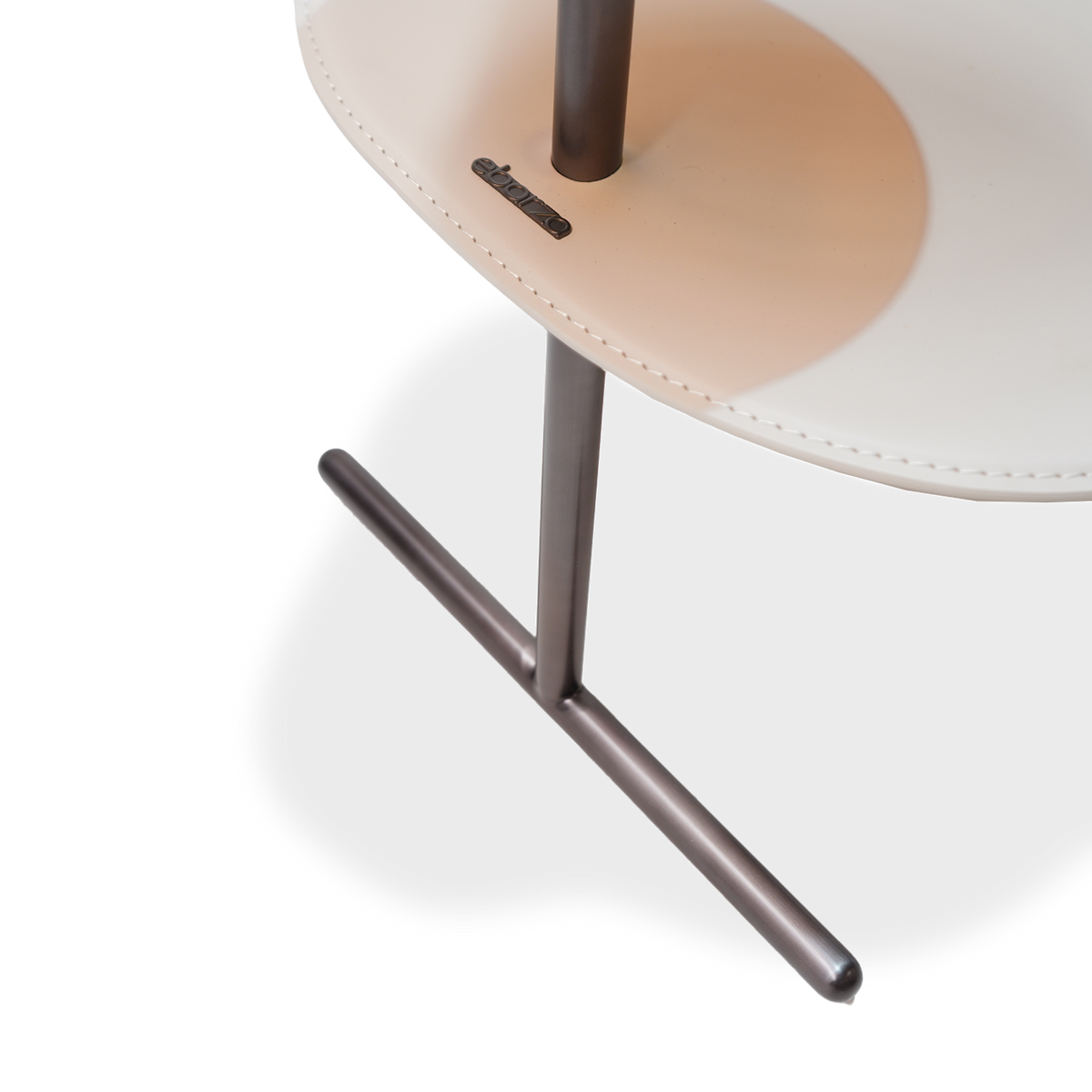 Modern nesting side tables by BEACON, sleek design, with two interconnected tables featuring a smooth finish and contemporary style.