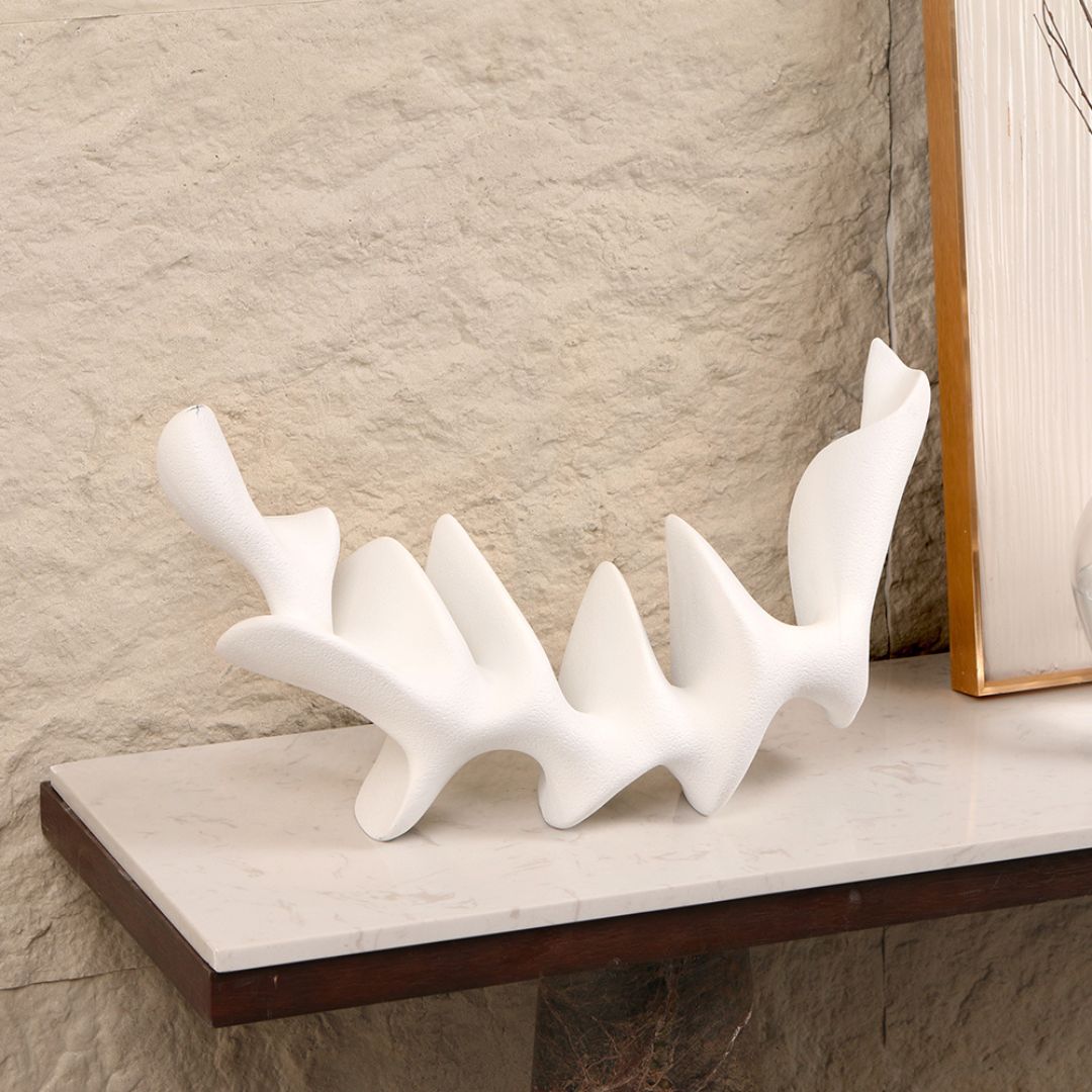 Moon-shaped desktop sculpture by BEACON, home decor figurine with sleek, modern design for stylish desk decoration.