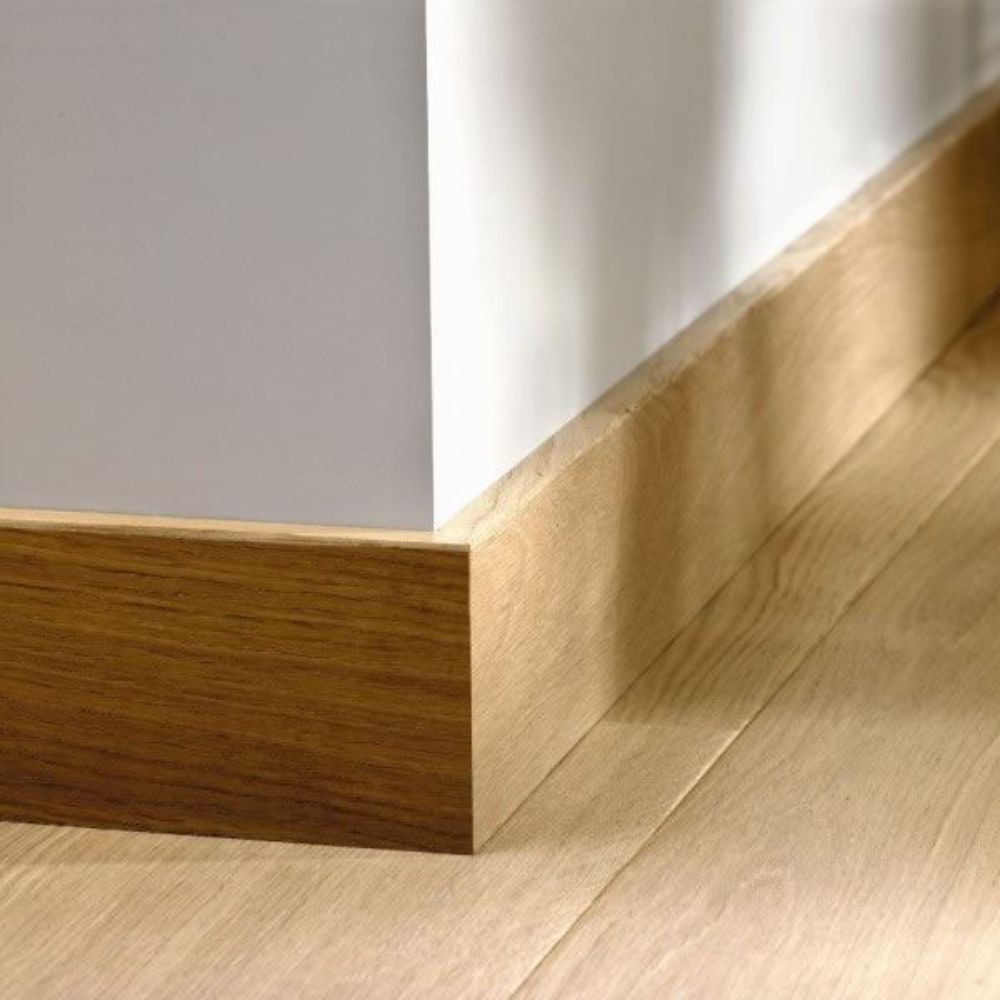 Natural oak veneer skirting board by BEACON, showcasing smooth wood grain and finished edges for interior decor.