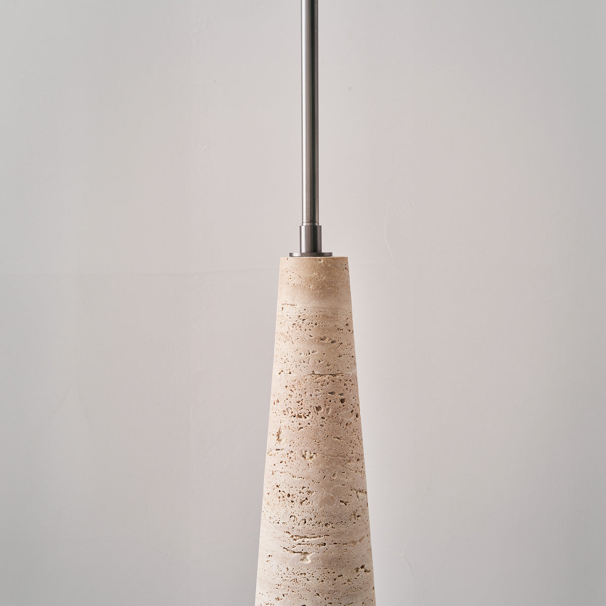 Natural travertine floor lamp by BEACON, JA-015F, featuring a sleek, modern design with a textured stone finish.