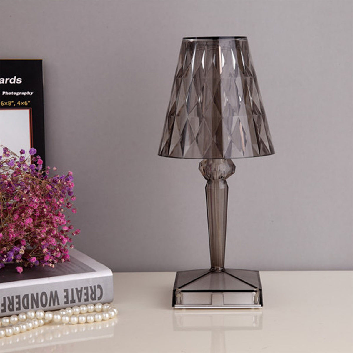 Smoke black BEACON desk lamp with night light feature, sleek modern table lamp with a minimalist design.