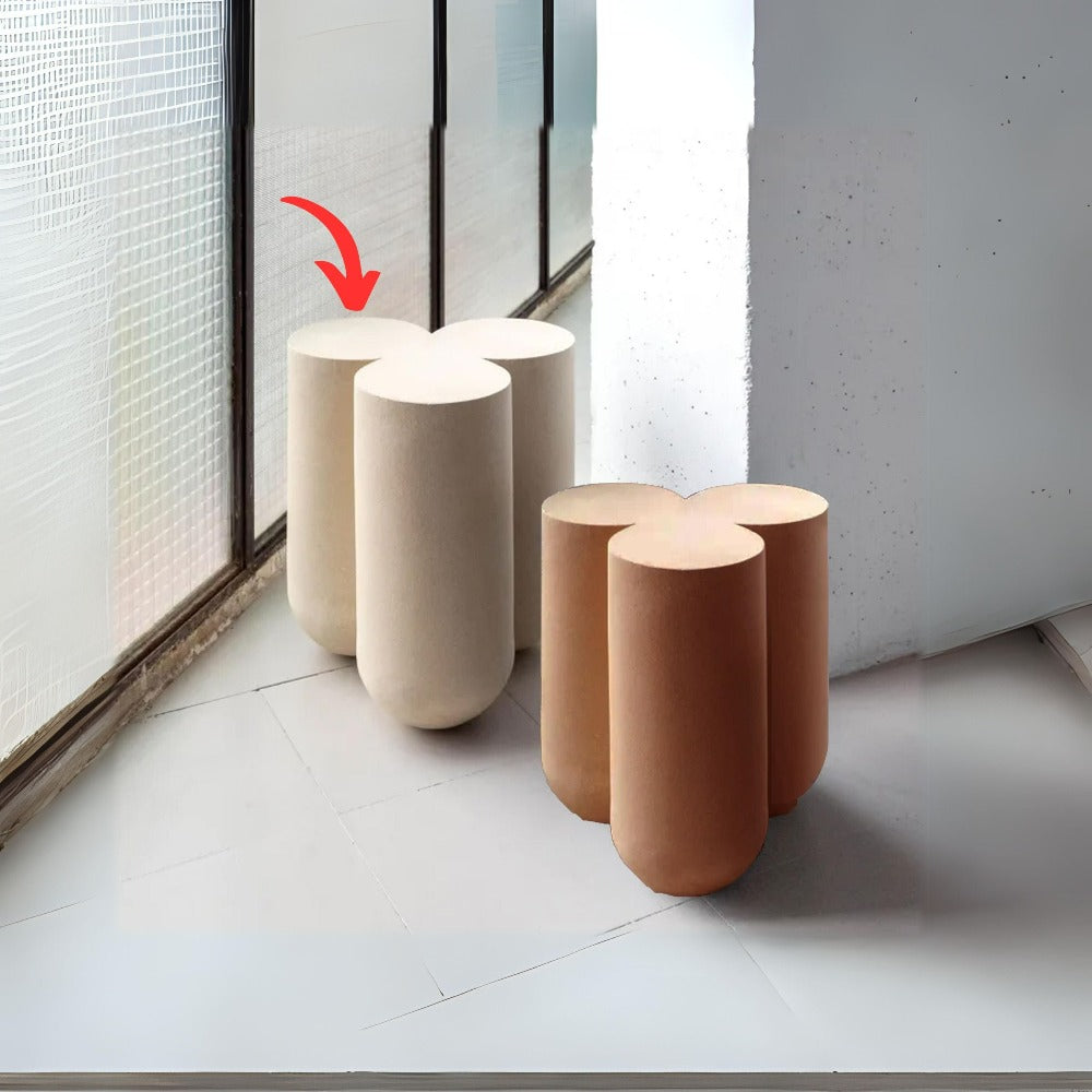 Beige oak and bent wood side table with modern design, featuring a smooth top and curved legs, ideal for living room decor.