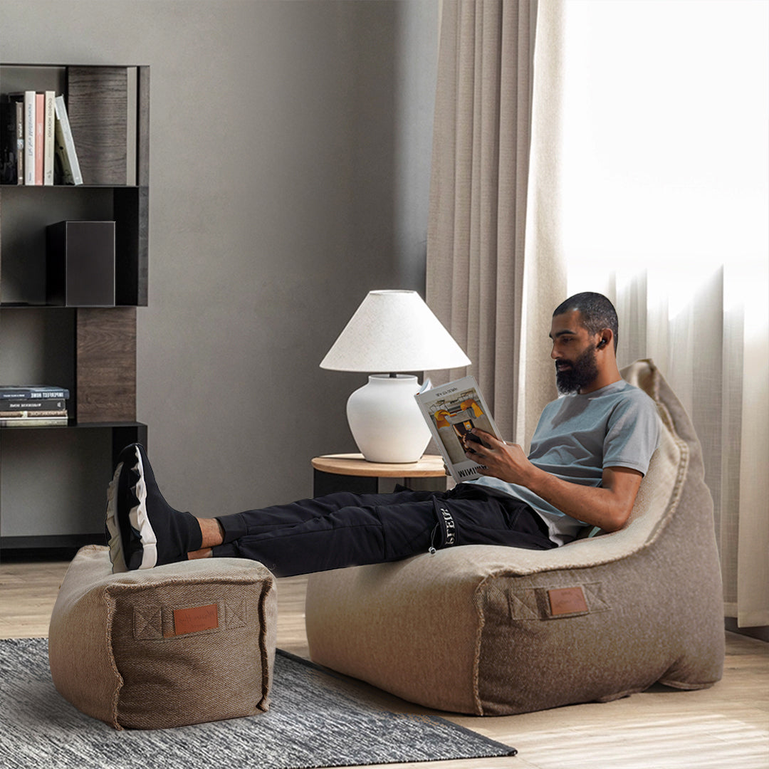 Olefin beige Sunproof bean bag with matching Ottoman by BEACON, showcasing soft fabric and comfortable seating.