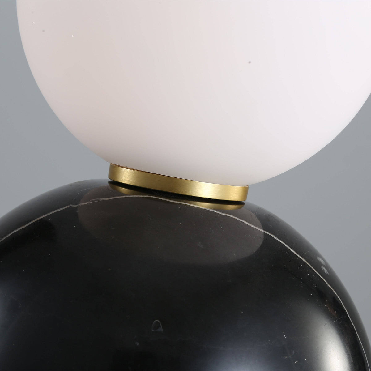 Opal glass shade with black marble base table lamp by BEACON, ideal for desk or table lighting decor.