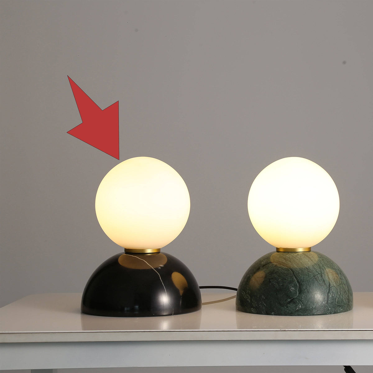 Opal glass shade with black marble base table lamp by BEACON, ideal for desk and table lighting.