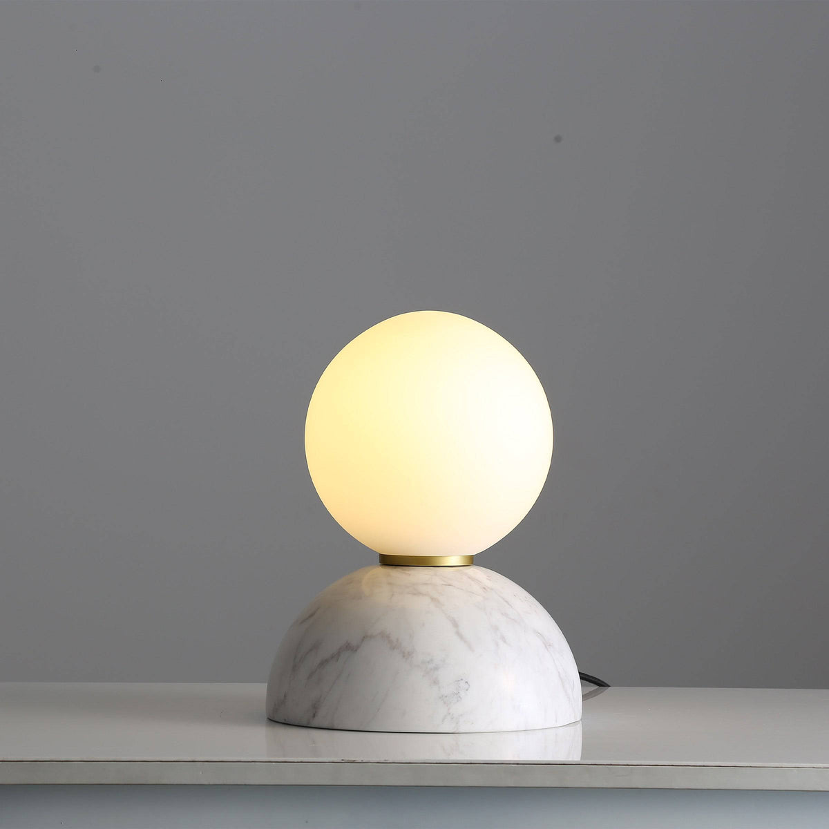 Beacon Civil table lamp with opal glass shade and white marble base, stylish desk or table lighting for modern interiors.