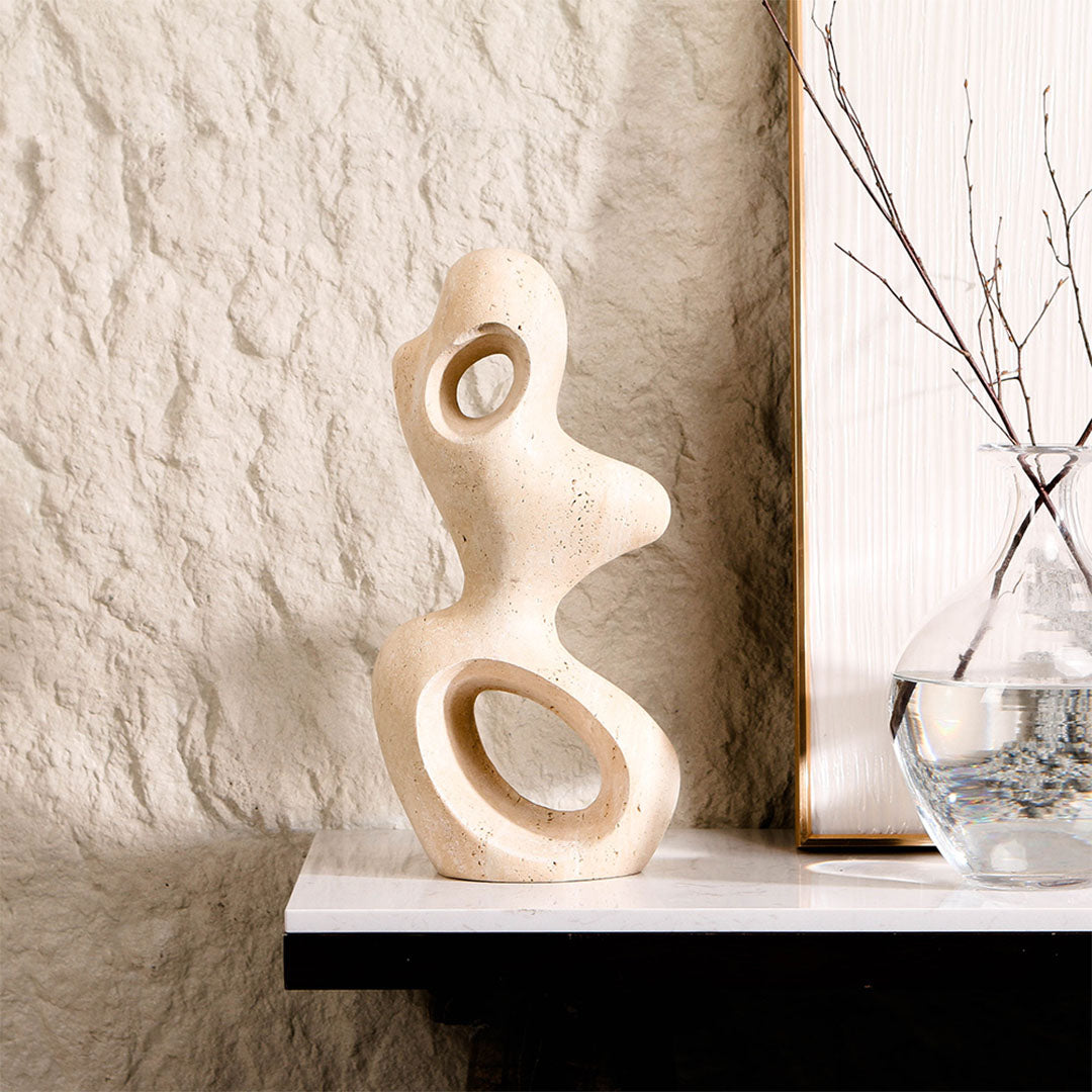 Organic shape marble sculpture for home decor by BEACON, showcasing smooth, artistic marble figurine with elegant curves.