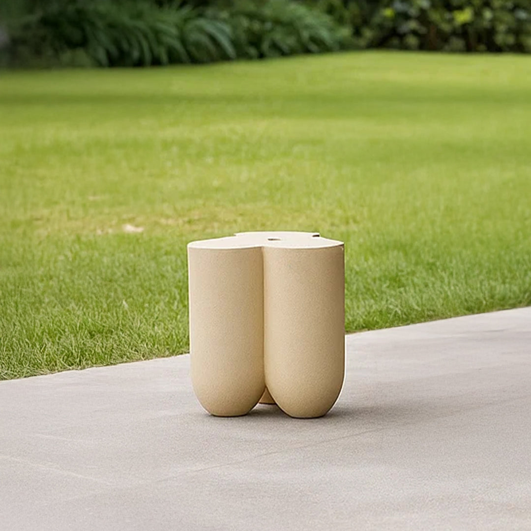Beige outdoor and indoor seating bench pouf by BEACON, versatile and cushioned for indoor or outdoor use.