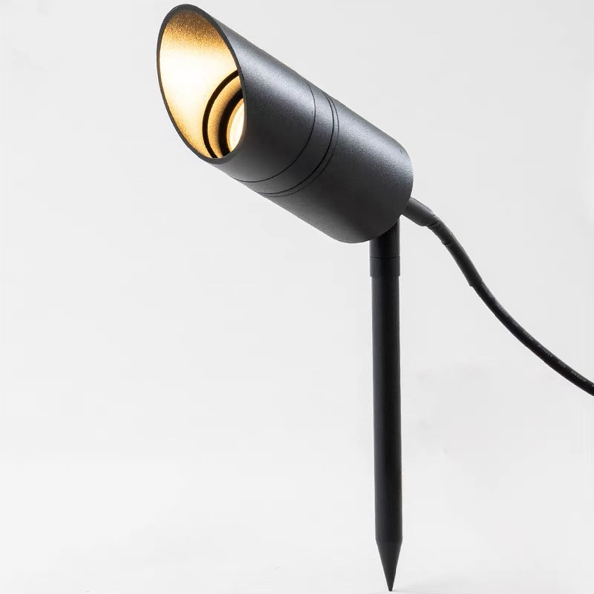 BEACON outdoor LED garden light HTD-K-2531-COB-2 in a garden setting, providing bright illumination for outdoor spaces