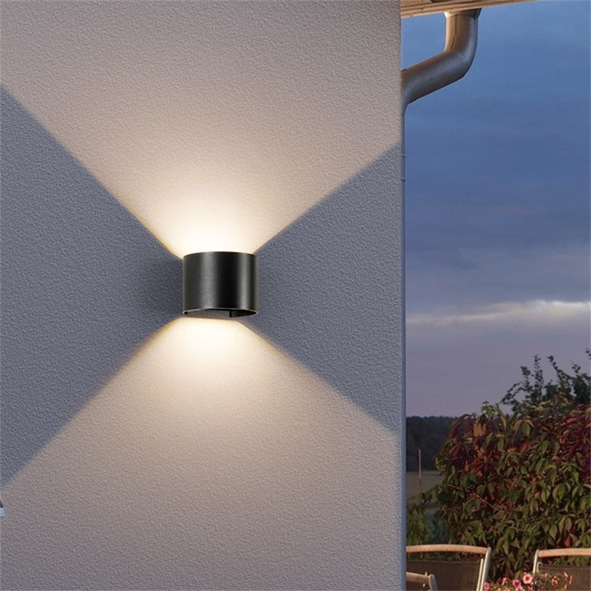Outdoor LED wall light HTD-K-2310 by BEACON, weather-resistant outdoor lighting fixture mounted on exterior wall.