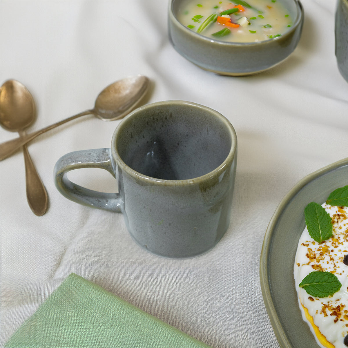 Grey Passifoy coffee and tea mug by BEACON, featuring a sleek ceramic design suitable for hot beverages.