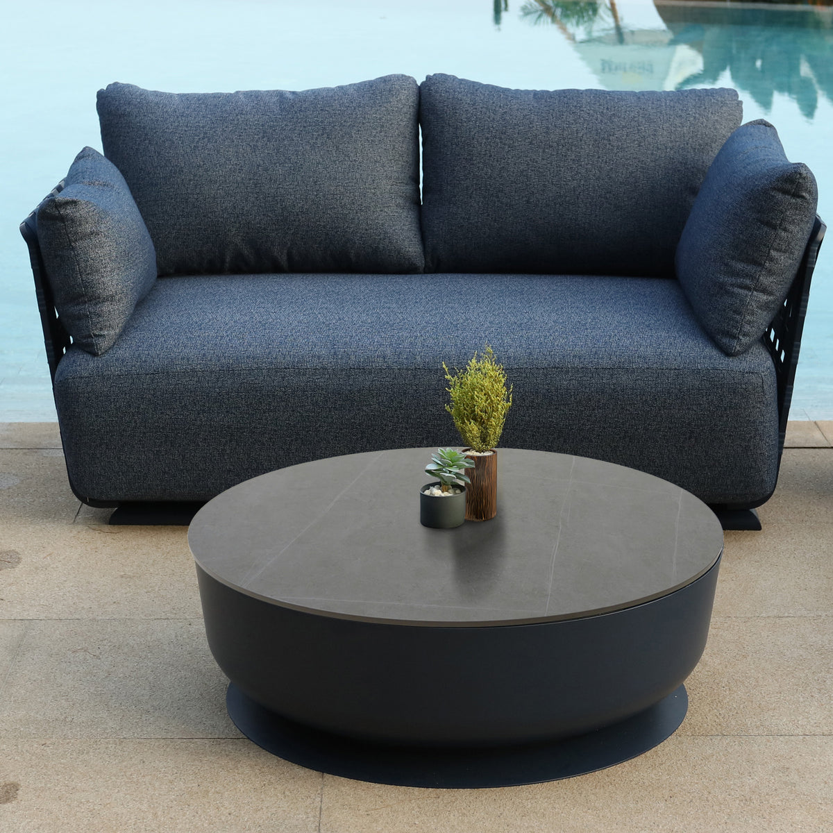 BEACON Penguin Outdoor Coffee Table MYX-CT00B made of durable outdoor materials, designed for patio or garden use.
