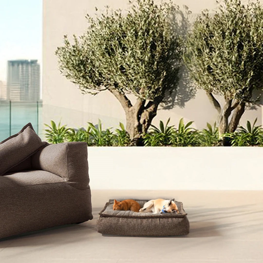 Small brown BEACON pet bed pouf with soft cushioned surface for pets, ideal for cozy resting.