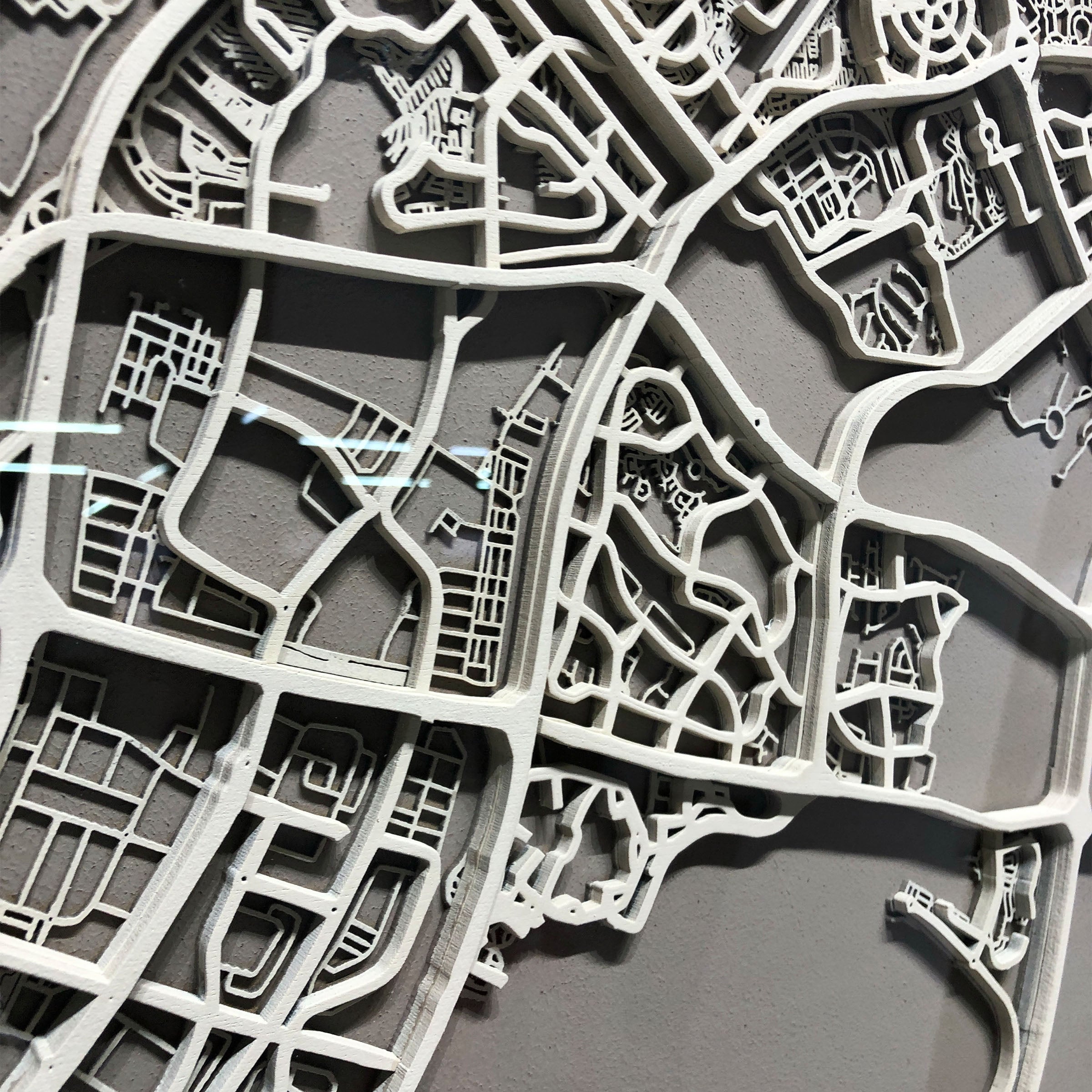 Handmade Abu Dhabi map painting by BEACON, 120x120cm, detailed city layout on canvas, pre-order with 90 days delivery.