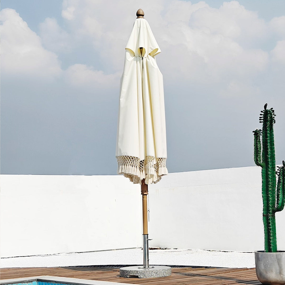 BEACON outdoor center pole umbrella with push-up and down system, gray fabric, sturdy metal pole for patio shading.