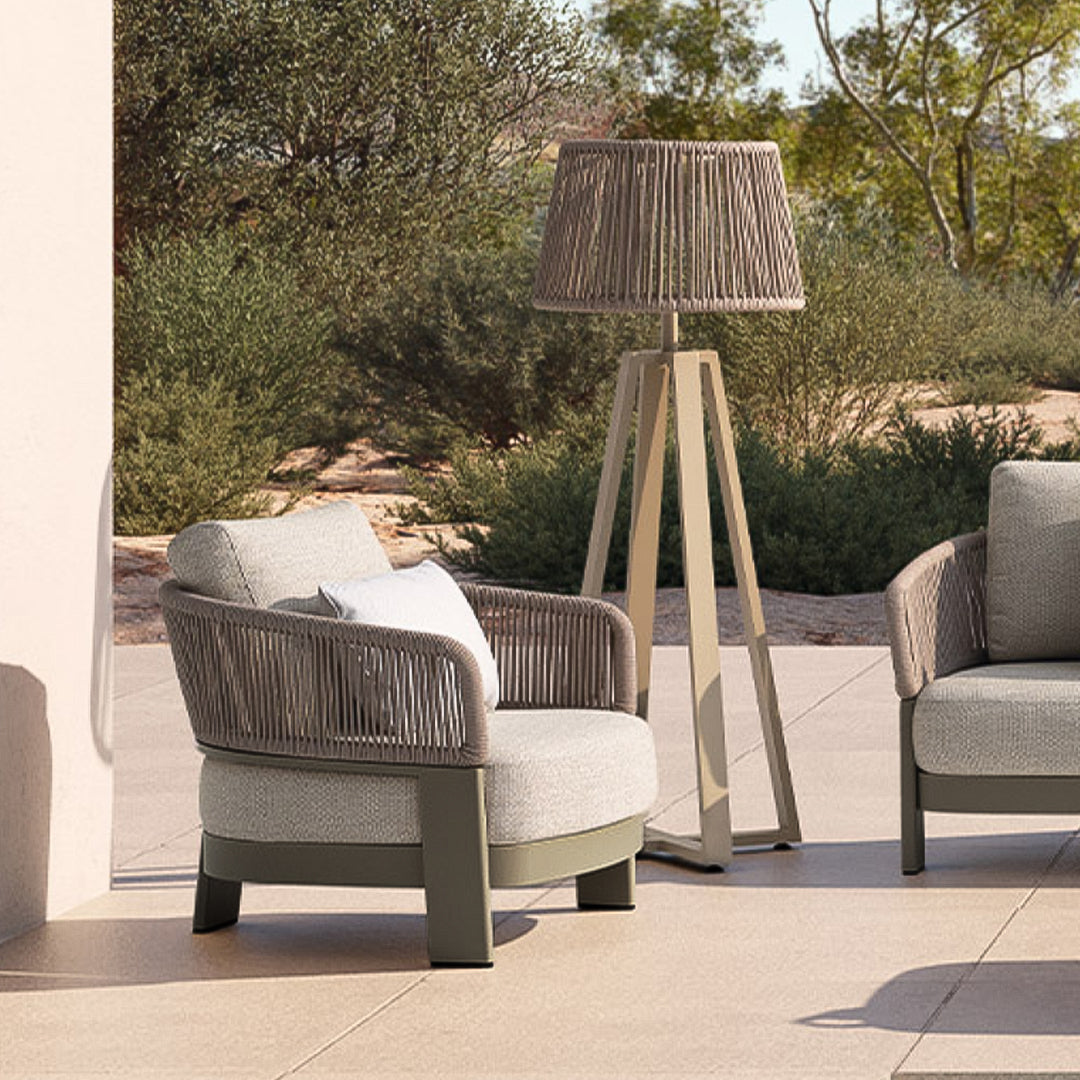 Cayenne outdoor armchair by BEACON, stylish outdoor sofa with armrests, designed for comfortable outdoor seating.