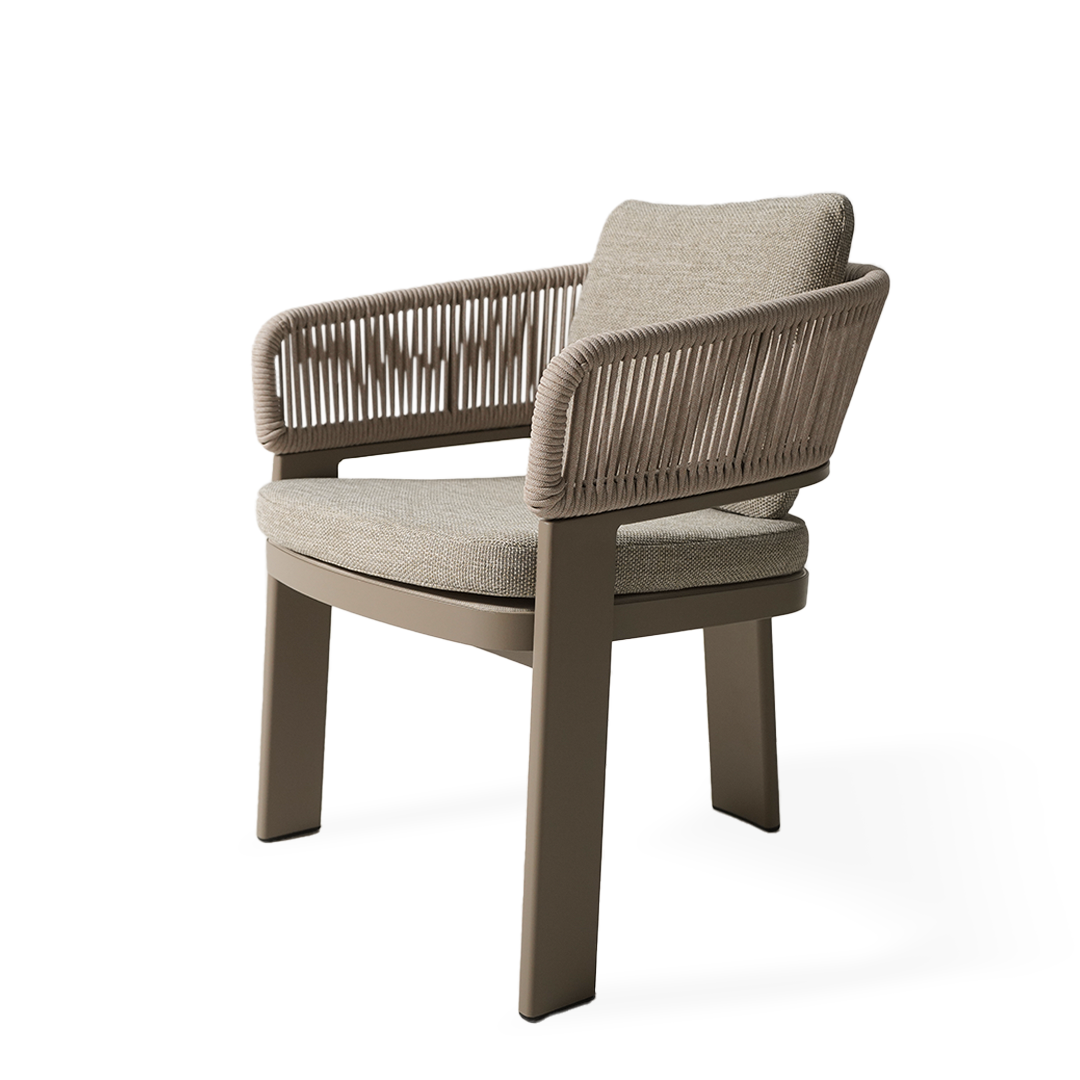 Outdoor Cayenne dining armchair by BEACON, featuring a stylish design with armrests, ideal for outdoor dining spaces.