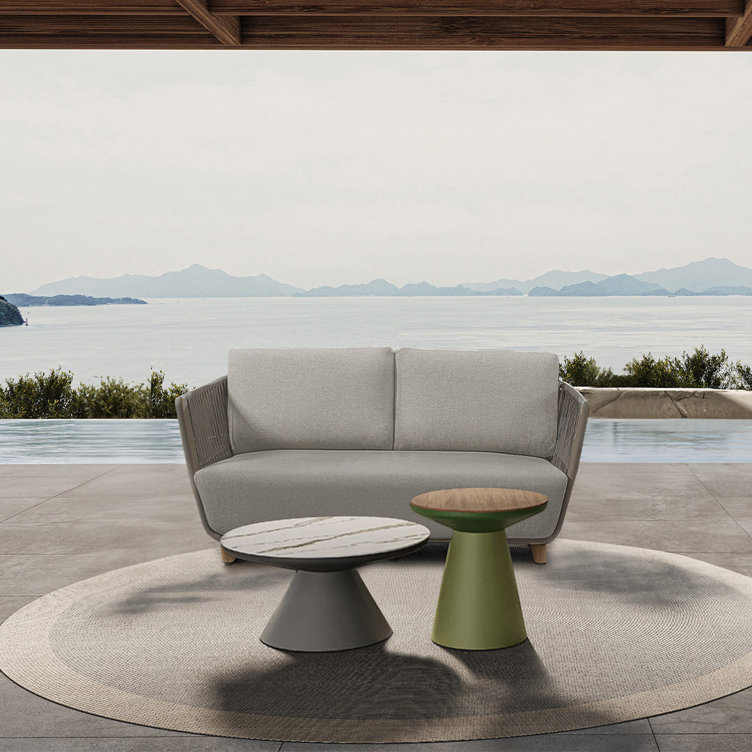 BEACON Marrakech outdoor 2-seater sofa with cushioned seats and woven rattan design, perfect for patio or garden lounging.