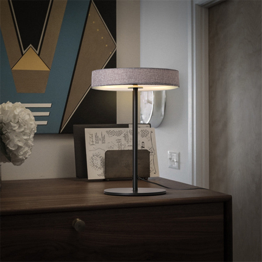 BEACON Crescent LED aluminum fabric table lamp with 45x30-inch design, modern desk lighting for home or office.