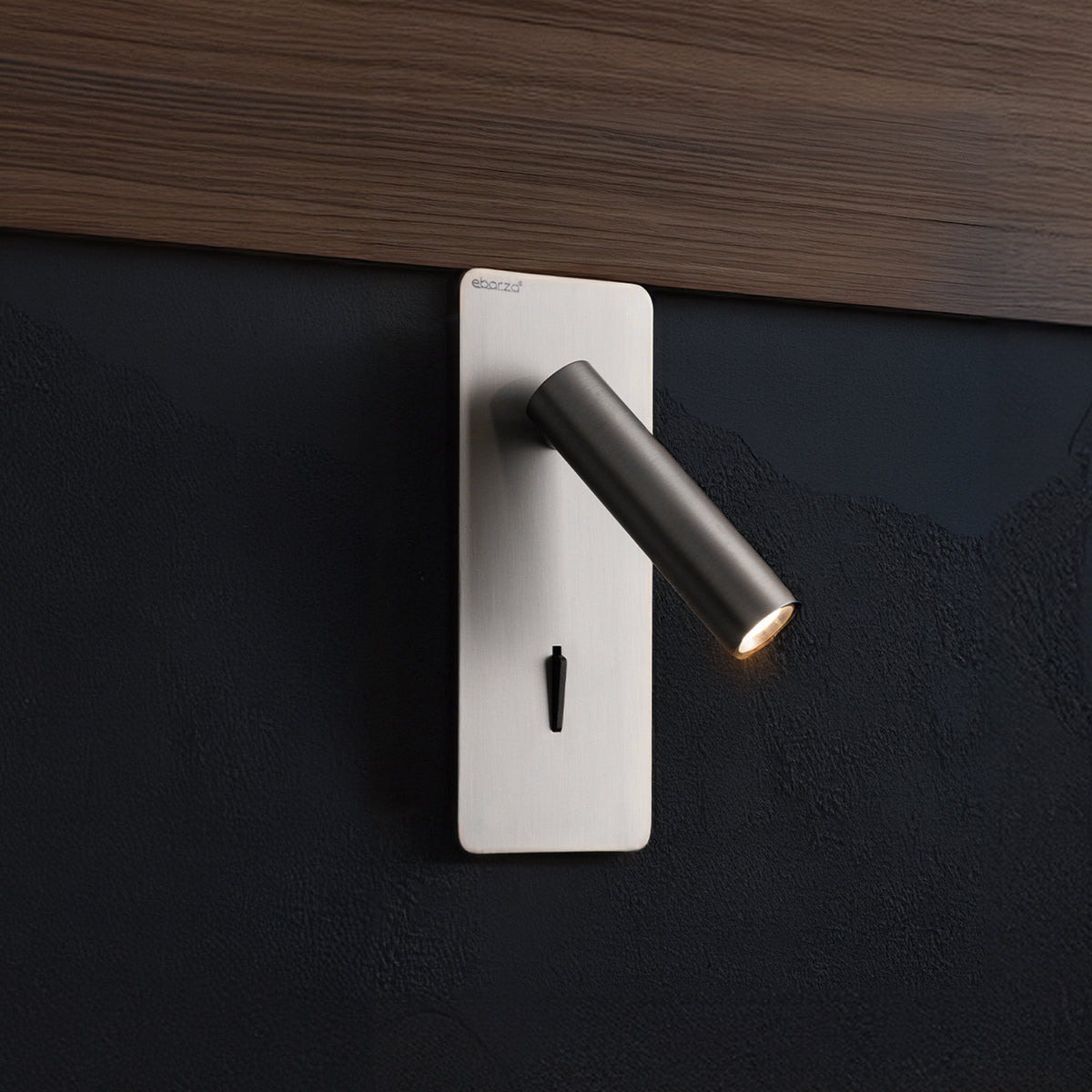 BEACON Gemini hotel-style wall reading lamp mounted on headboard, sleek design, ideal for bedroom wall lighting.