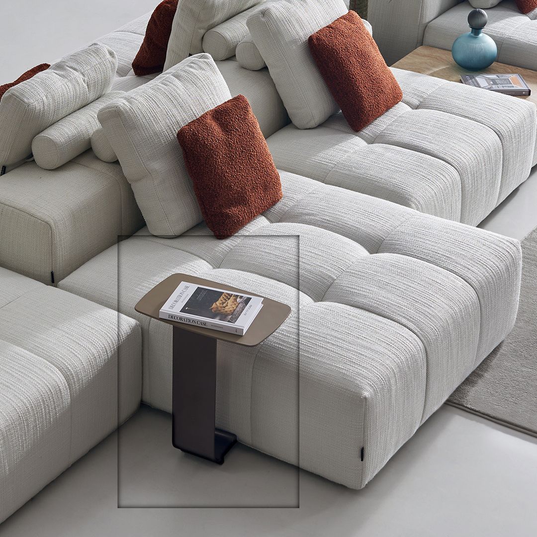 Bronze puzzle modular side table for sofas by BEACON, featuring a unique geometric design and versatile functionality.
