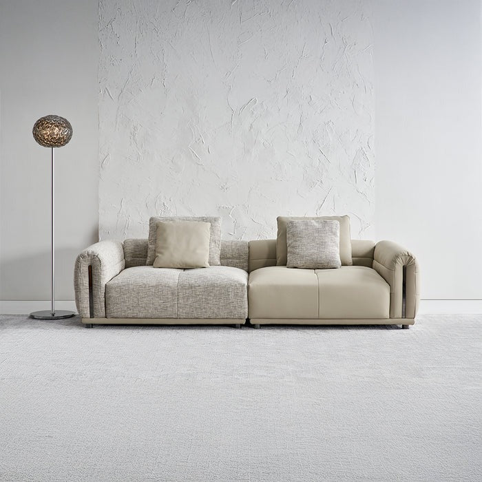 BEACON Quadro 2-seater sofa with plush fabric upholstery and modern design, ideal for living rooms.