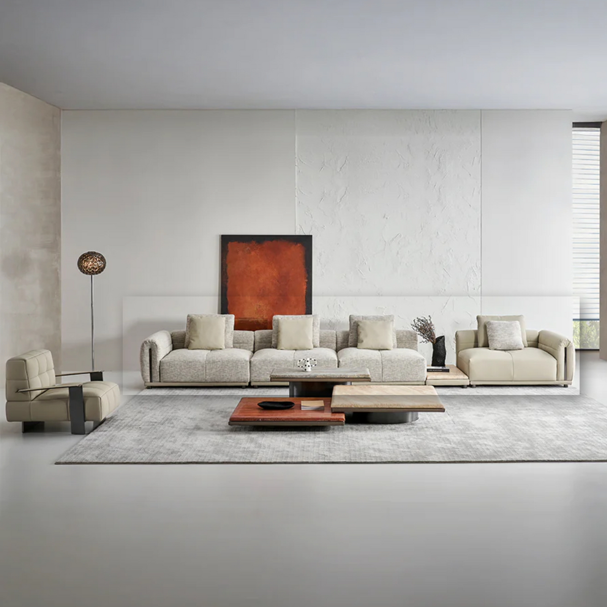 BEACON Quadro 6 Seater sofa with plush cushions and modern design, shown in a spacious living room setting.
